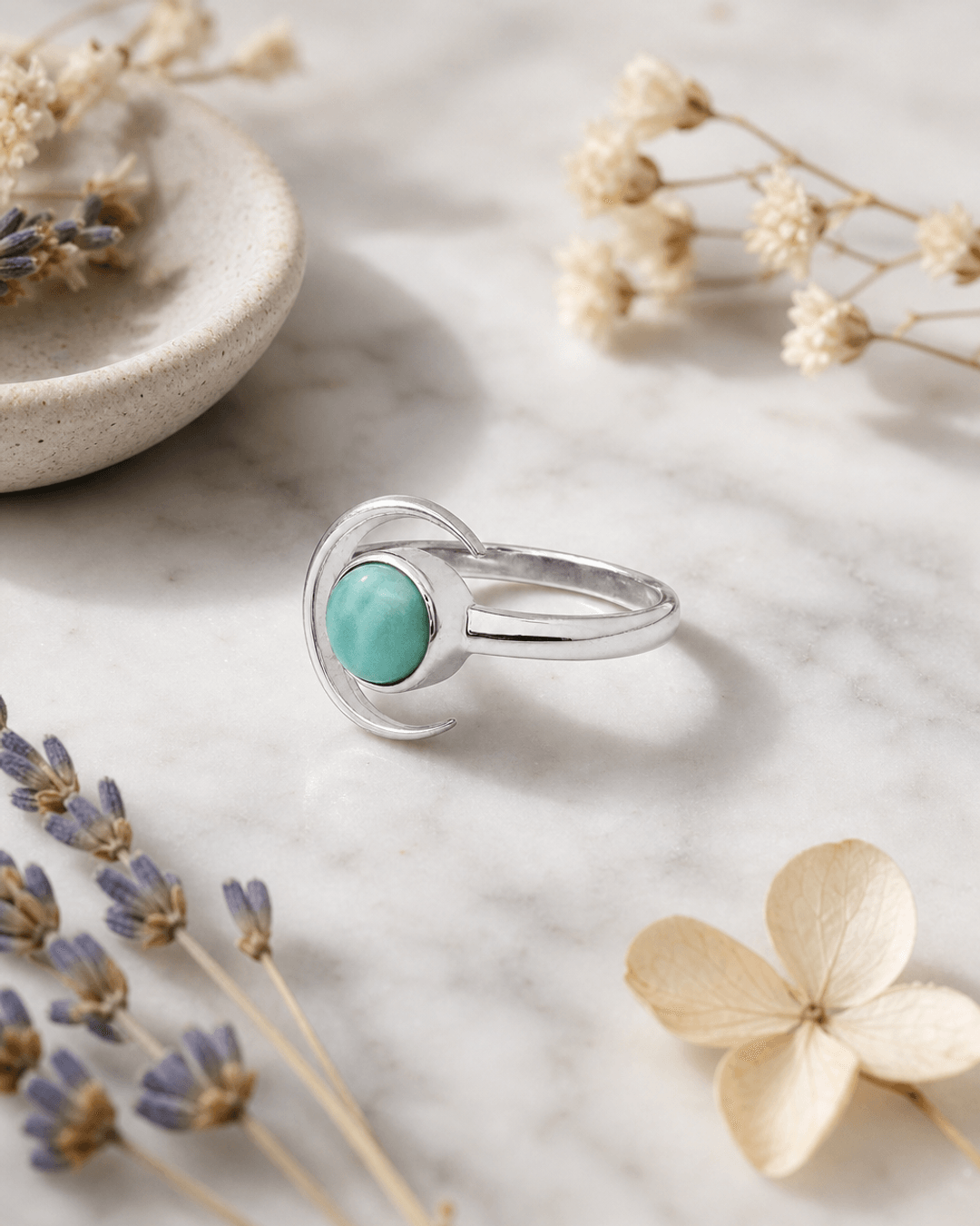 Sterling Silver Larimar Gemstone Ring with Crescent Moon Design — rings, editorial marble lifestyle photo