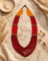 Sunrise Statement Beaded Necklace — necklaces, editorial marble warm lifestyle photo