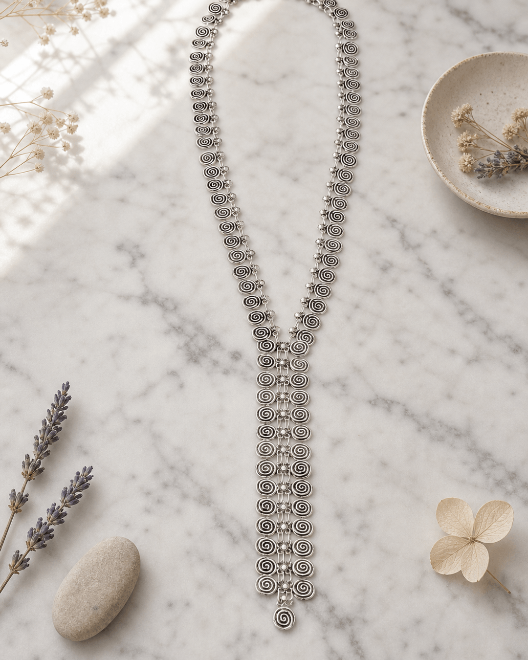 Swirly Circle Y-Shaped Necklace — necklaces, editorial marble lifestyle photo