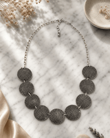 Textured Dome Disc Necklace — necklaces, editorial marble lifestyle photo