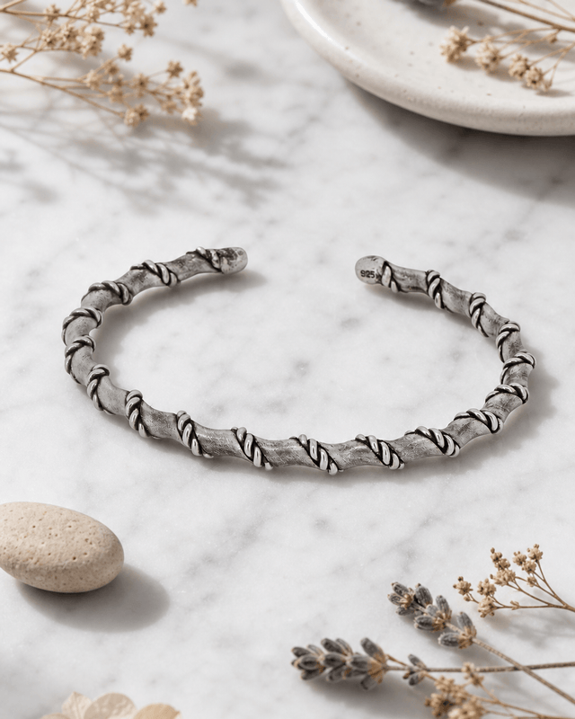Hilltribe Sterling Silver Rope-Wrapped Adjustable Cuff Bracelet — bracelets, editorial marble lifestyle photo