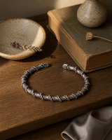 Hilltribe Sterling Silver Rope-Wrapped Adjustable Cuff Bracelet — bracelets, sunlit shelf lifestyle photo