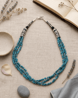 Triple-Strand  Genuine Turquoise Chips and Sterling Silver Bead Necklace - Southwest-Inspired, Handcrafted in USA — necklaces, flatlay linen lifestyle photo