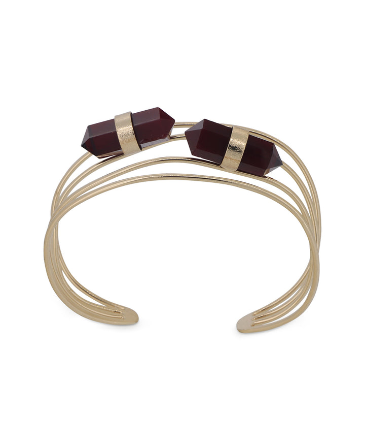 Elegantly crafted adjustable cuff bracelet, showcasing its stylish design and captivating red onyx accents