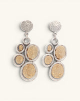 Turkish two-tone boho dangle earrings showing hammered gold disc clusters in silver rings, front view on white background