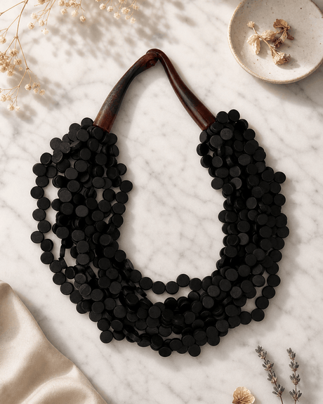 Twisted Multi-Strand Black-Brown Necklace — necklaces, editorial marble lifestyle photo