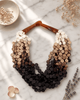 Twisted Multi-Strand Warm Tones Necklace — necklaces, editorial marble lifestyle photo
