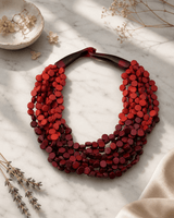 Two-Tone Twist Wood Disc Necklace — necklaces, editorial marble lifestyle photo
