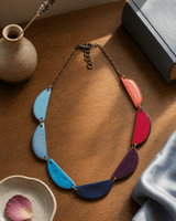 Vibrant Crescent Tagua Necklace — necklaces, sunlit shelf lifestyle photo