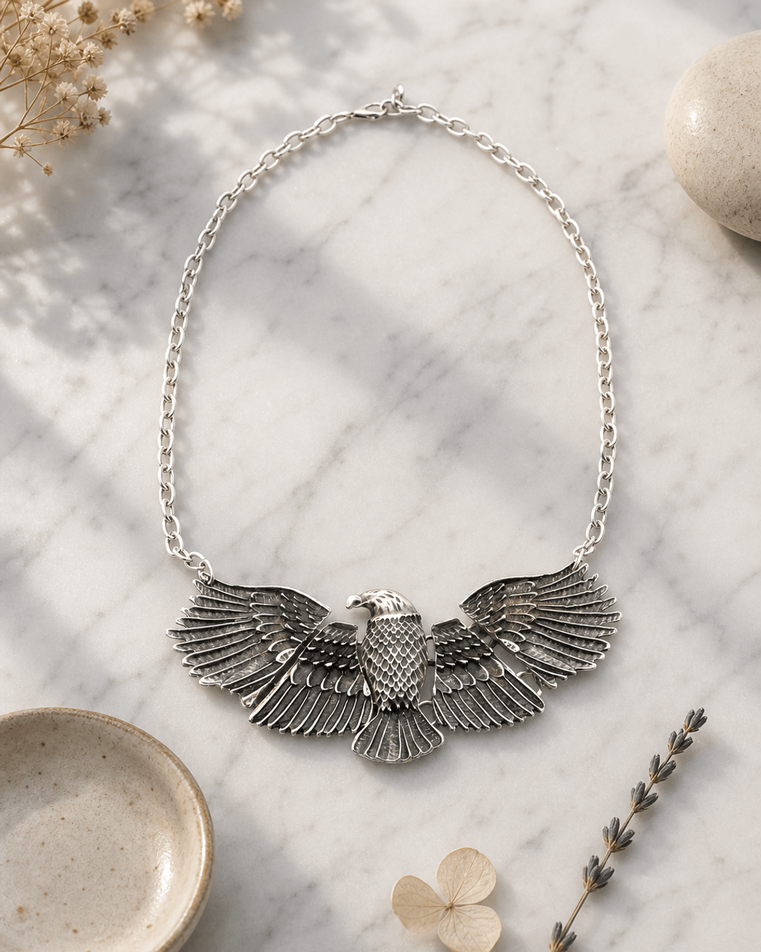 Wings of Power Eagle Necklace — necklaces, editorial marble lifestyle photo