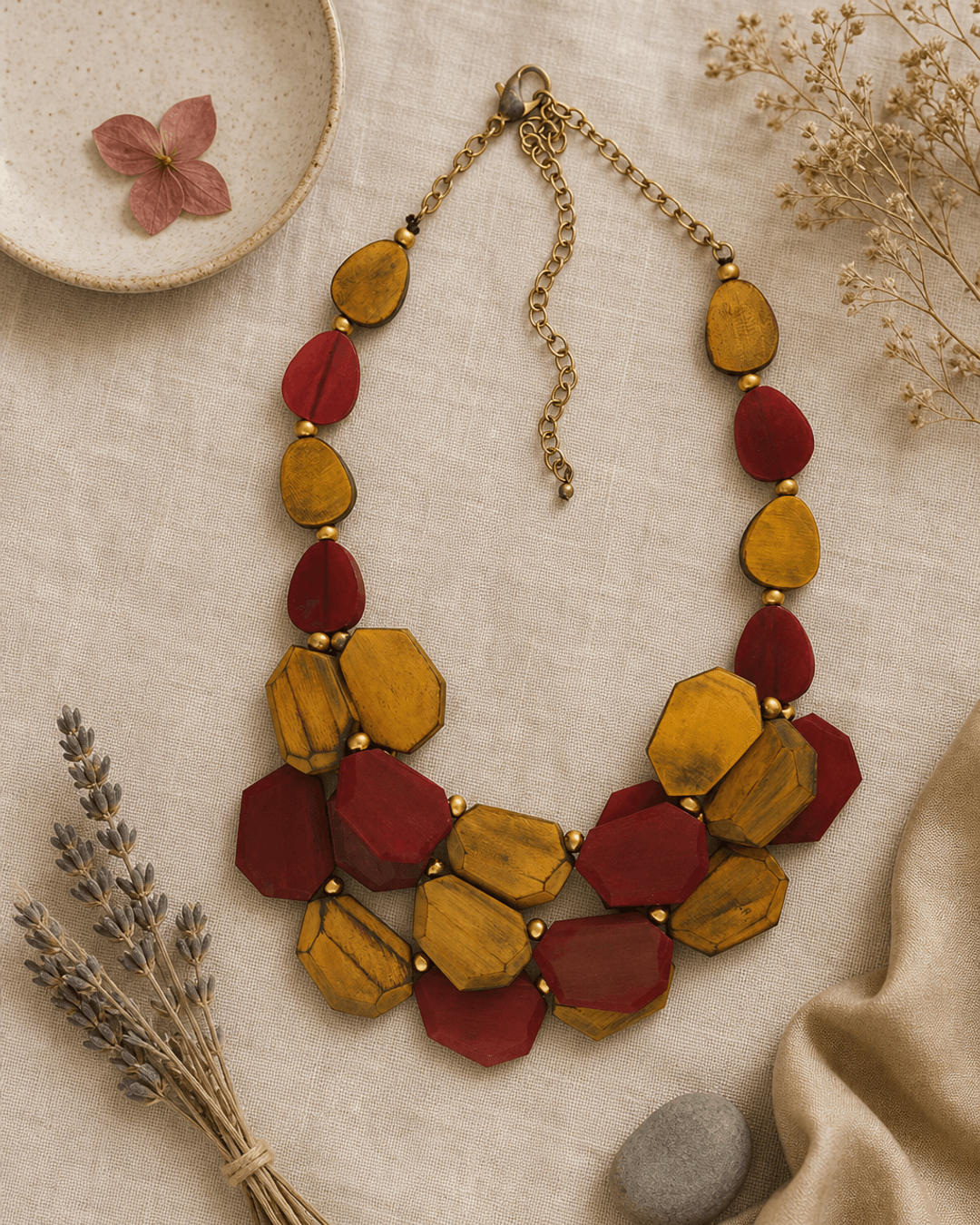 Yellow and Red Dyed Horn Necklace — necklaces, flatlay linen lifestyle photo