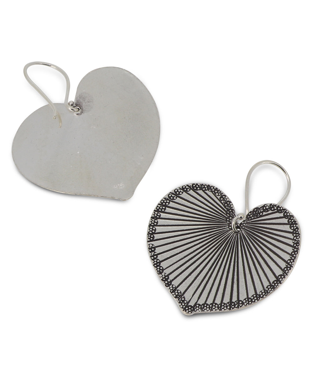 Ethically sourced silver betel leaf earrings from Laos, showcasing intricate craftsmanship