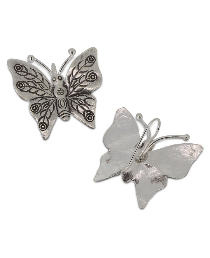 Ethically sourced silver butterfly design earrings from Laos, showcasing intricate craftsmanship