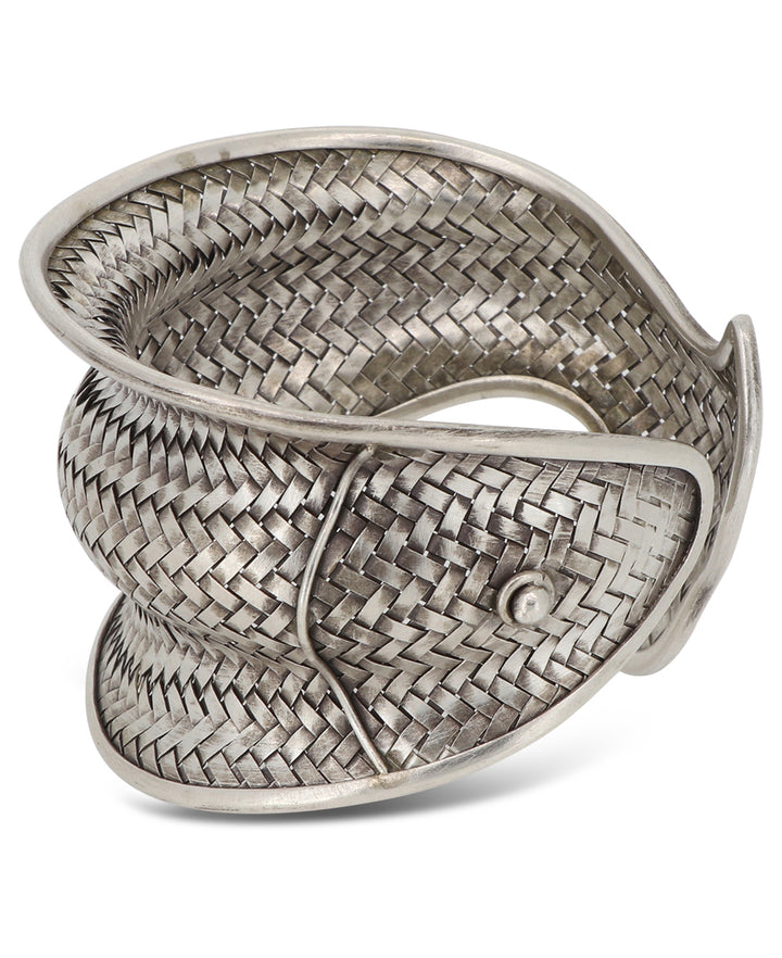Exquisite handcrafted silver cuff bracelet inspired by Laotian culture and traditions