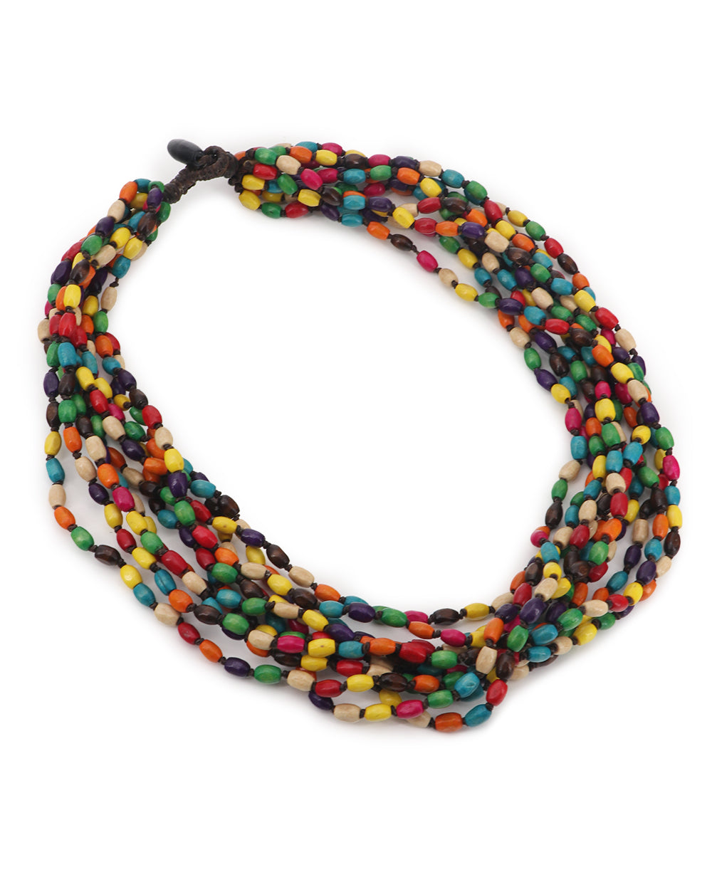 Button and loop closure on this colorful beaded necklace with 10 strands made of boxwood beads