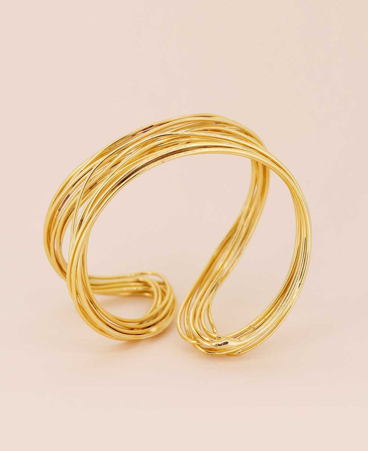 Elegant adjustable gold-plated brass wire bracelet with intricate 10-wire design, handcrafted in Turkey